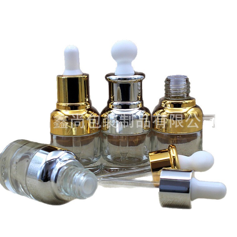 Botella de vidrio transparente de alta gama 20ml botella de esencia cabeza de goma plana botella de aceite esencial botella cuentagotas botella de líquido cosmético vacío