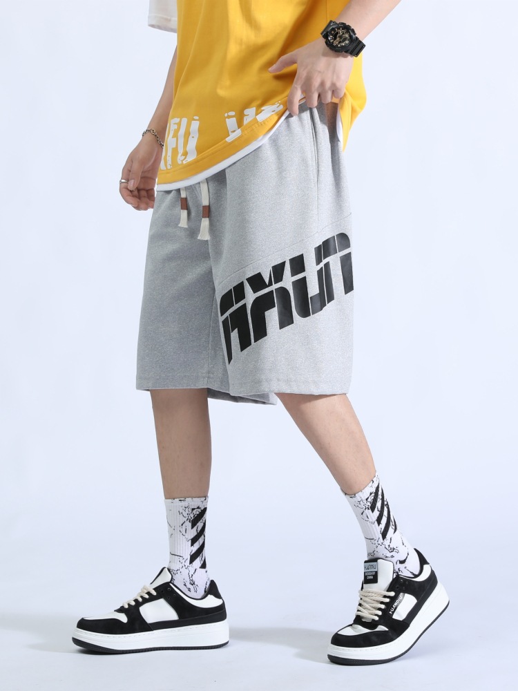 Pantalones cortos para niños verano 2025 nuevo suelto elástico de punto de moda pantalones deportivos juveniles de cinco puntos pantalones micro-elásticos