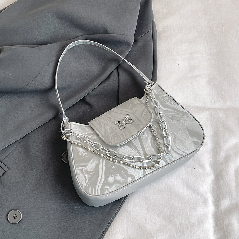 Bolsos debajo de las axilas para mujeres 2024 nuevo estilo francés nicho de alto nivel cadena de estilo extranjero bolso de hombro bolso pequeño explosivo