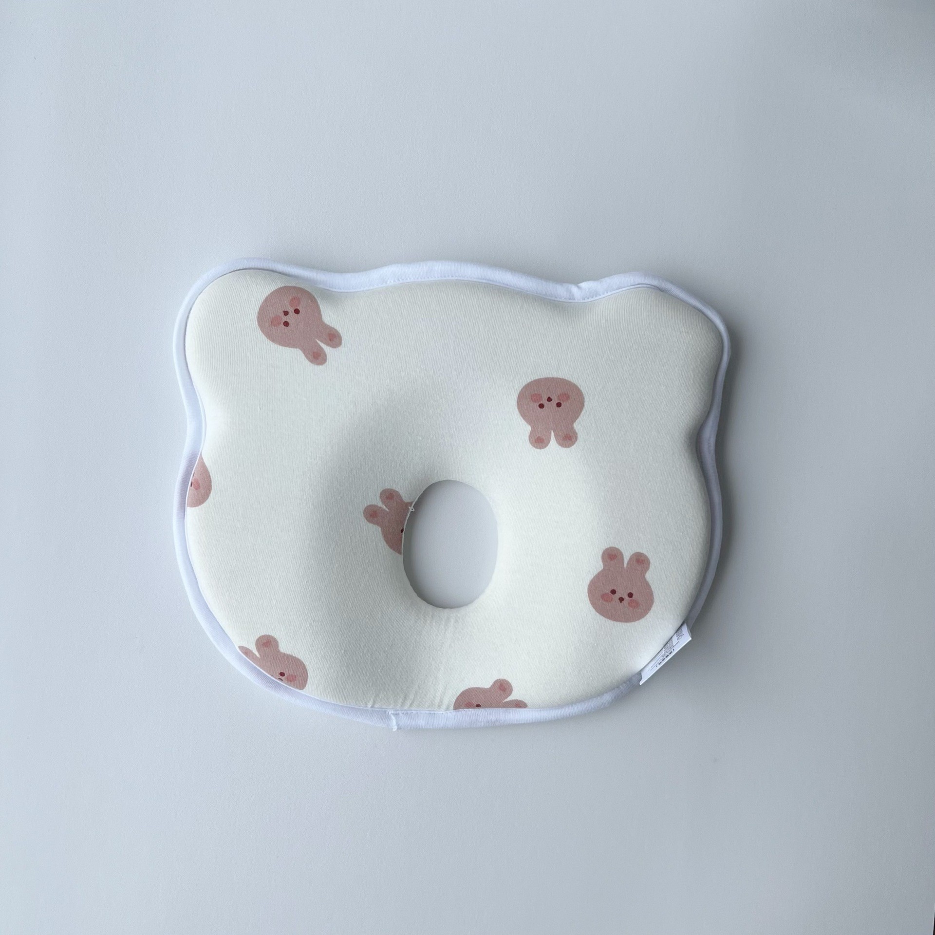Nueva almohada de conejito a juego
