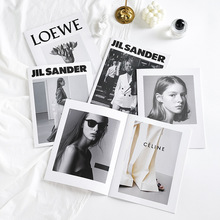 INS封面人物英文杂志24页网红高颜值搭配艺术背景墙摆件拍照道具