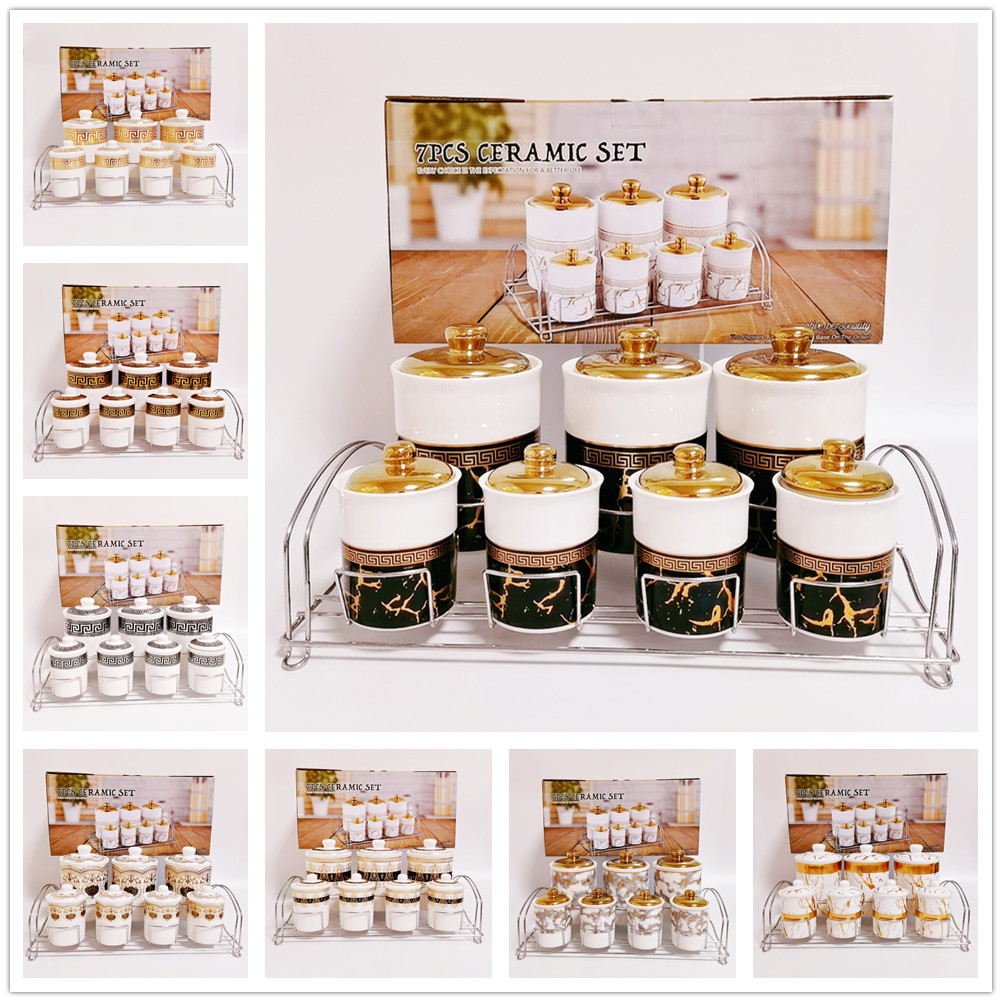 Exportar a Oriente Medio Arabia Saudita cerámica galvanoplastia cilíndrica condimento tarro almacenamiento café tarro con marco de hierro de doble capa