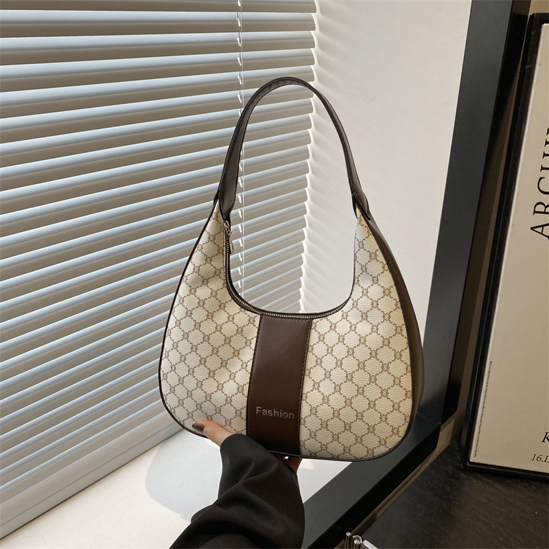 Arte y literatura color contrastante empalme viaje bolso de media luna portátil retro 2025 personalidad nueva moda braza de hombro bolso de mujer