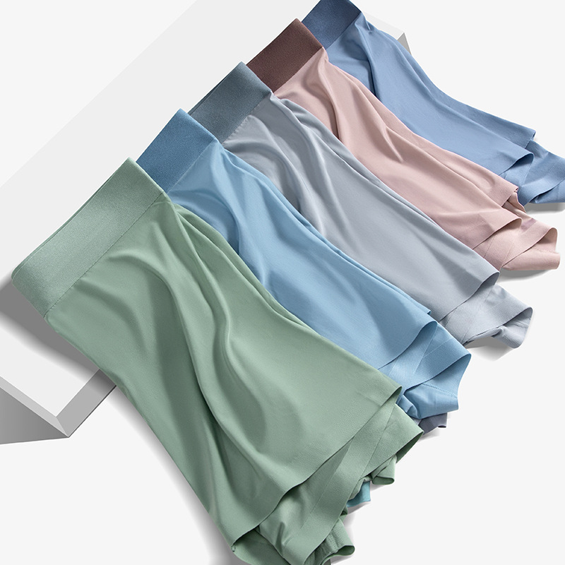 Ropa interior de seda de hielo para hombres pantalones cortos de cuatro esquinas transpirables sin costuras para niños 2025 nuevos pantalones boxer de primavera y verano al por mayor