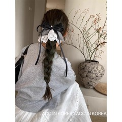 韓国レースのスカートの蝶結びの低い馬尾のヘアピン2025の新型のフランスの甘い心の王女の半髪の飾りの女性