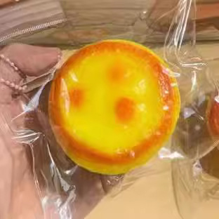 Tongle TPR slow rebound simulated red pinchable egg tart wholesale
