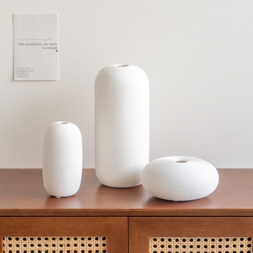 Nuevo chino cerámica florero decoración del hogar artesanía moderna simple Zen blanco flor titular de la flor al por mayor