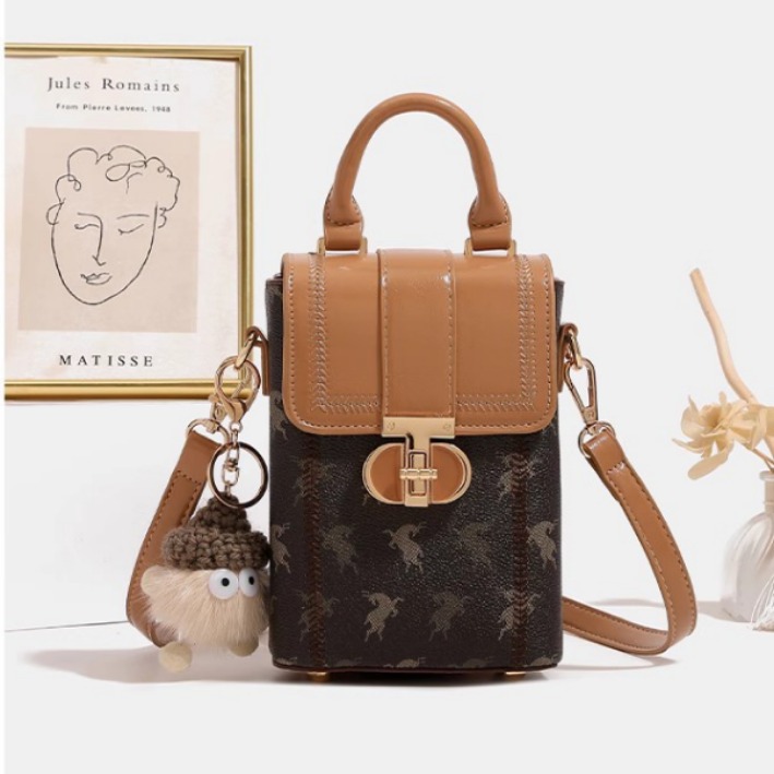 Otoño y invierno mini bolso de mujer 2026 nuevo nicho de hombro pequeño bolso de hombro de alto nivel bolso de mano pequeño bolso de teléfono móvil