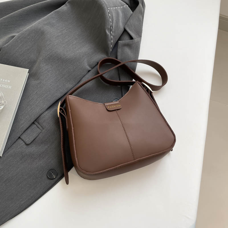 2025 primavera nueva moda bolsos de mano de hombro de gran capacidad bolsos tote bolsos de mujer bolsos de viaje bolsos versátiles para mujeres