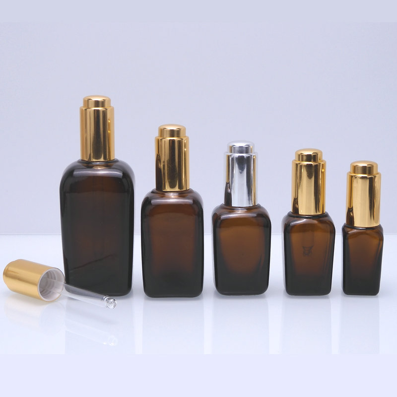現物は茶色の方精油瓶10ml 100mlの四角形の厚い底の精華の液体の瓶の茶色のガラスを供給して瓶を分けます。|undefined