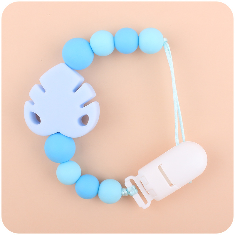 Suministros para bebés chupete cadena creativa bebé dibujos animados hojas silicona mordedura cadena anti-gota molar Nuevo