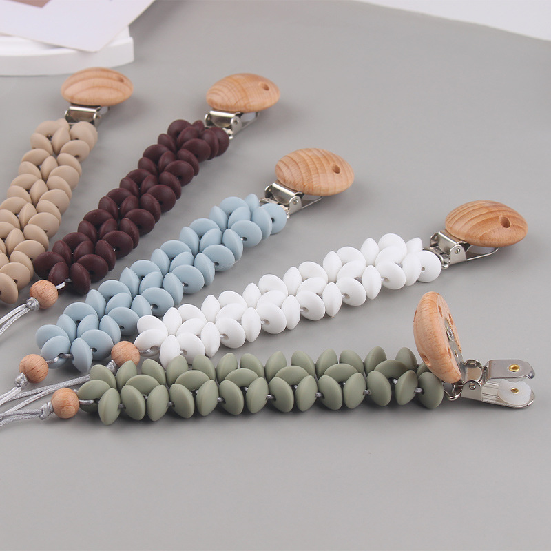 Nuevos productos para bebés, cadena de chupete de pétalo, pinza de chupete de haya con cuentas de silicona de viento para bebés, Amazon