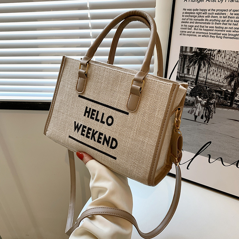 Simple retro lienzo de moda de hombro bolsa de mano para mujeres 2022 nueva moda casual bolso de mano ligero de gran capacidad