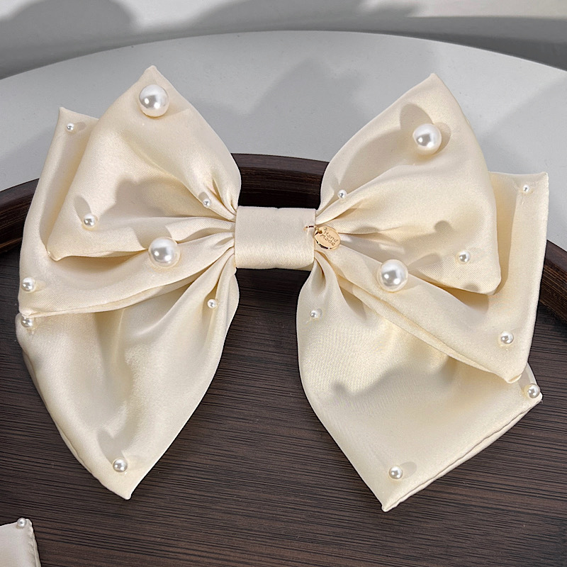 Fashion Solid Color Bowknot Shape Imitation Pearl  Fabric Hair Clip display picture 3