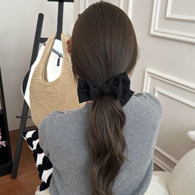 2025 nuevo arco gris bola de cabeza cabeza abrazadera de cabello de invierno otoño sensación de alto nivel detrás de la cabeza abrazadera de cabello mujer