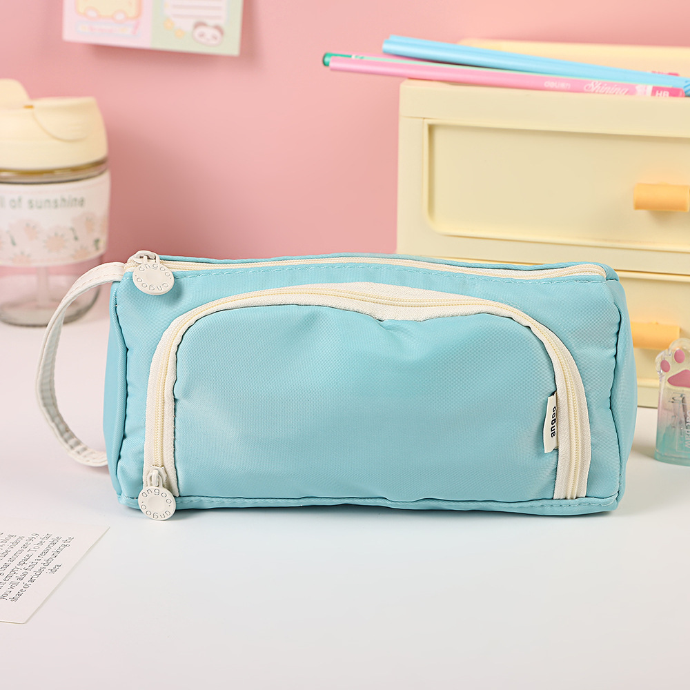 Bolso para lápices con ventana triangular transfronteriza Versión coreana de la caja de papelería de color sólido simple Bolsa de papelería de gran capacidad multifuncional creativa