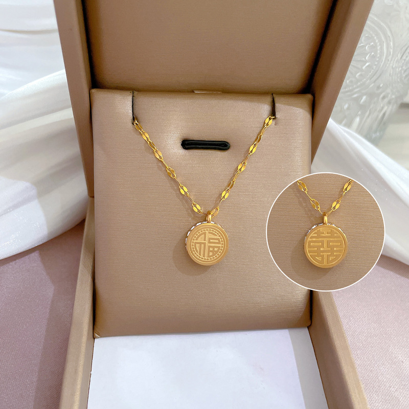 Collier femme symbole fu double face en or véritable bijoux_voghion.com
