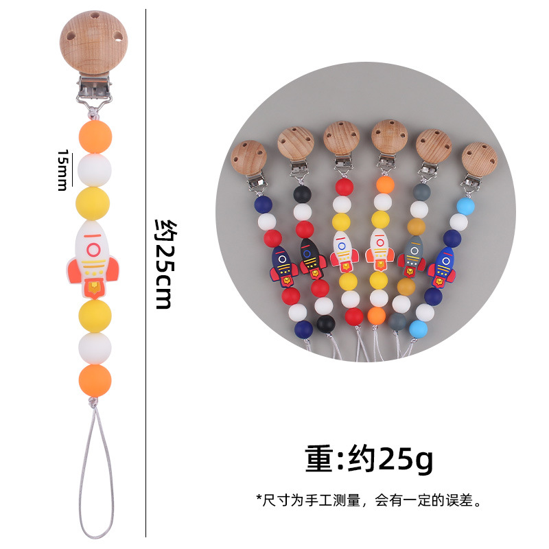 Nuevos suministros para bebés cohete de dibujos animados pequeño mordedor creativo DIY silicona mordedura molar Cadena de pezón cadena anti-caída