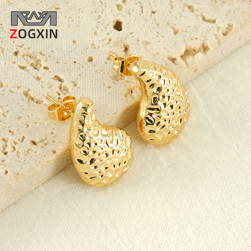Cruz-frontera europea y americana desigual textura gota-en forma de pendientes de moda todo fósforo de acero inoxidable pendientes de la joyería al por mayor para las mujeres