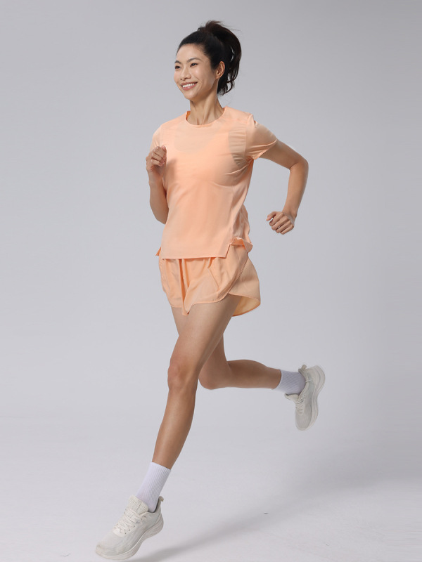 春夏の丸首はシームレスにtシャツの網の糸に合わせてスポーツの半袖の女性の新型のカジュアルな速乾性のランニングの上着をつなぎ合わせます。|undefined