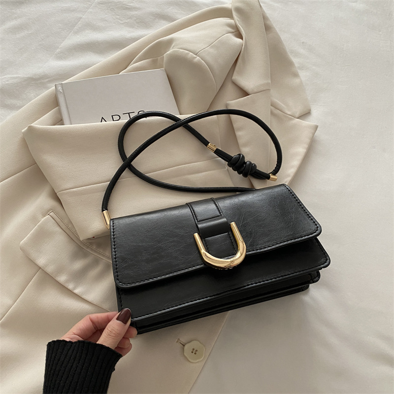 Diseño francés de nicho retro bolso debajo de la axila para mujeres 2024 otoño y invierno nuevo paquete de mano de hombro de alta calidad