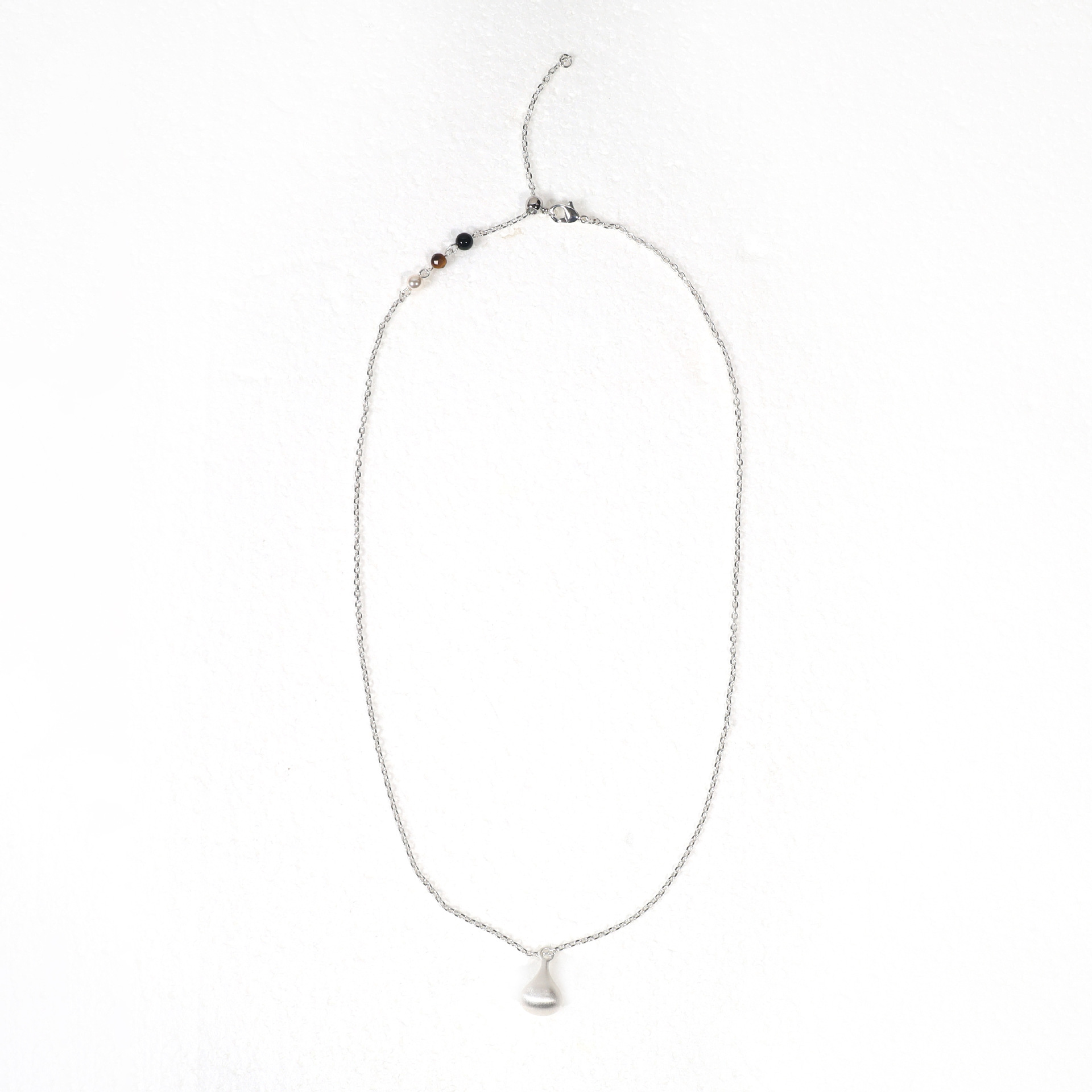 Hand-drawn + natural stone [small water droplets]