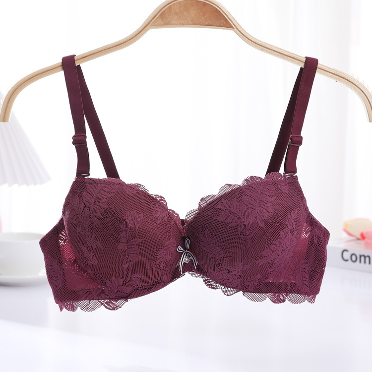 Fábrica de stock pequeño pecho grueso sujetador sexy encaje reunido ropa interior de mujer con anillo de acero sobre el bra de caída