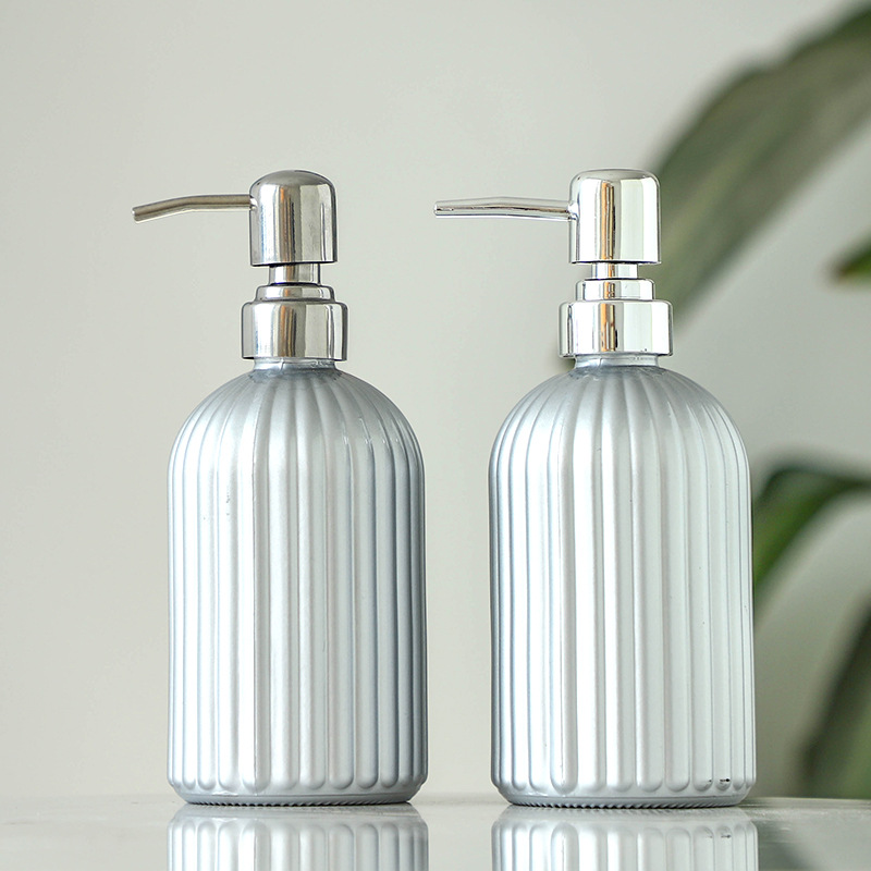 Botellas de vidrio para jabón y champú