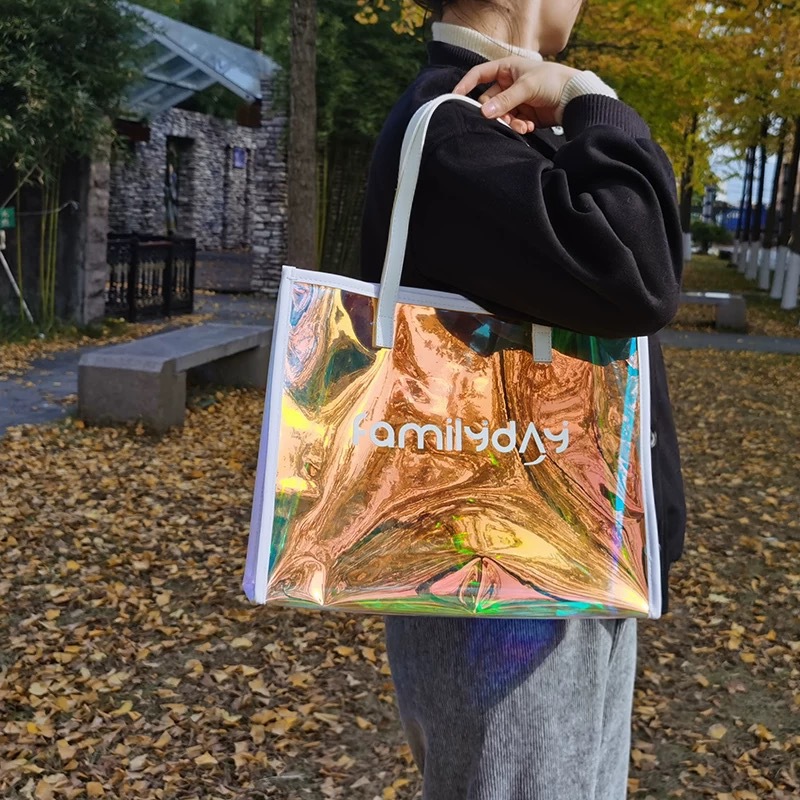 Bolsa de mano transparente de pvc, bolsa de ropa láser colorida, bolsa de compras, bolsa de regalo de plástico ins, bolsa de gelatina de red tpu