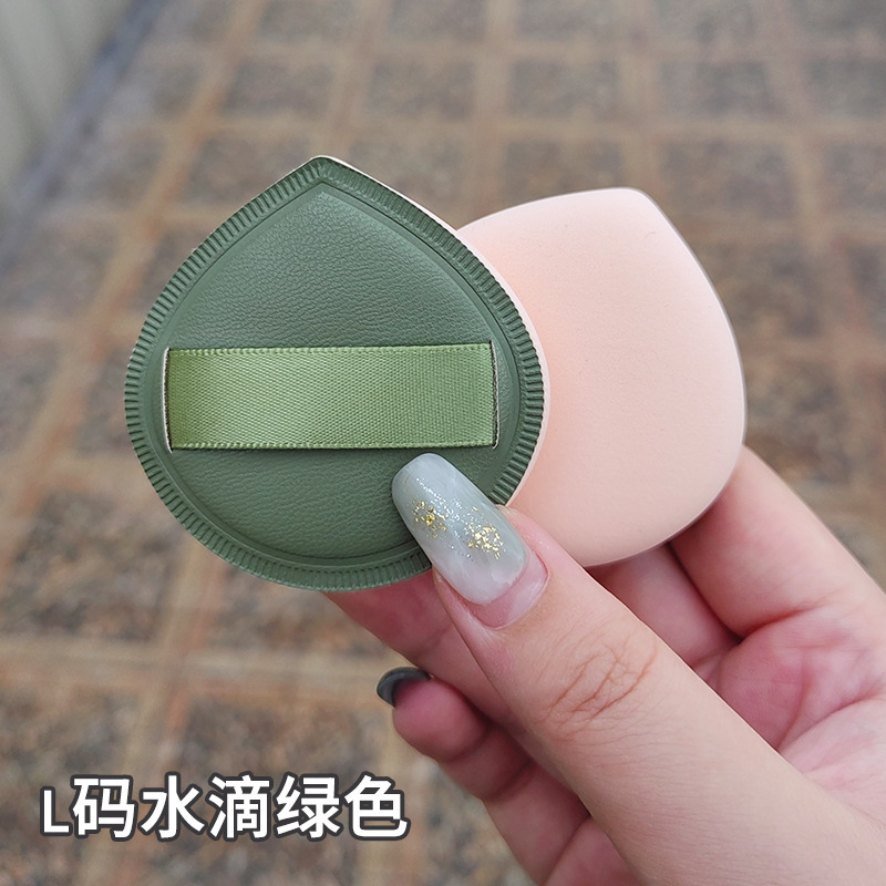 100分パフの木の大きいサイズのマシュマロのパフの空気感の乾湿の両用の粉の底液はエアクッションのパフを使います。|undefined