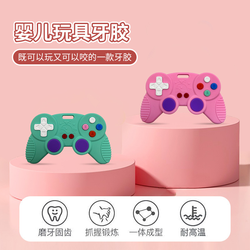 Navidad transfronteriza manija de juegos de descompresión de silicona de grado alimenticio diente infantil resistente a la comida mano palito de molienda de dientes para bebés