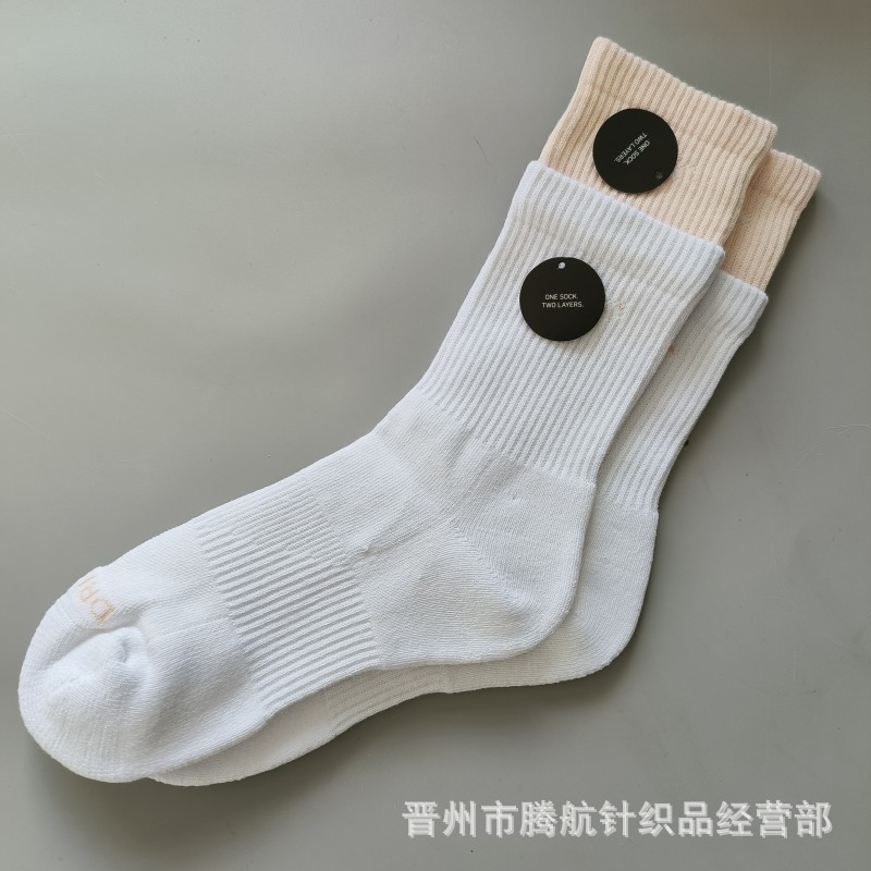 蘇万ナイキの靴下のカラーの二重は男女の中で長い筒のタオルの底のスポーツの靴下をつなぎ合わせてバスケットボールの靴下を走ります。