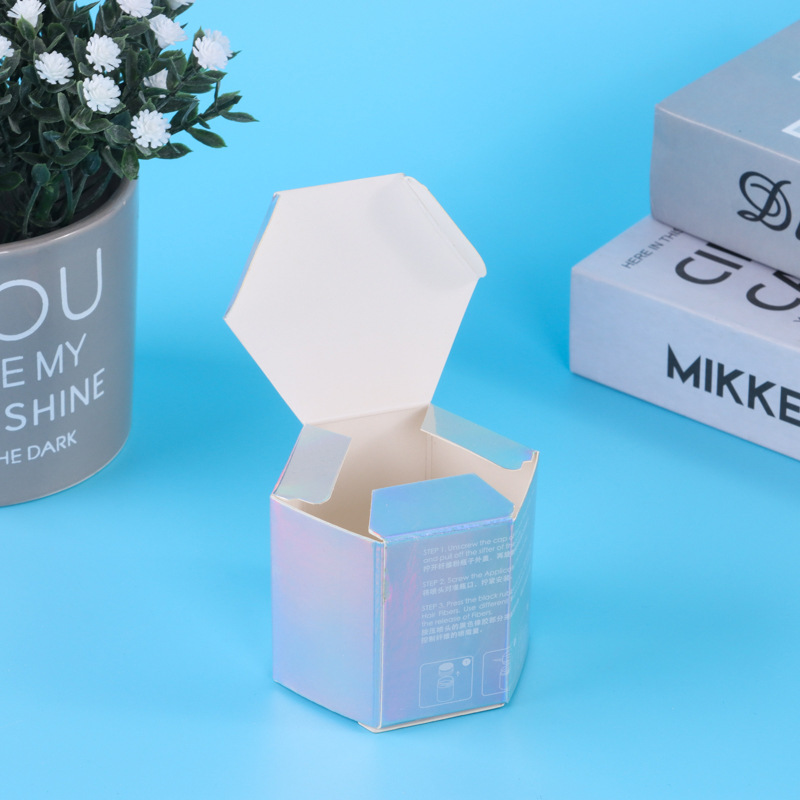 Caja de cartón láser para embalaje de Symphony, set de crema para ojos de cosméticos, productos digitales, artículos de primera necesidad, caja ciega, caja de cartón plateada