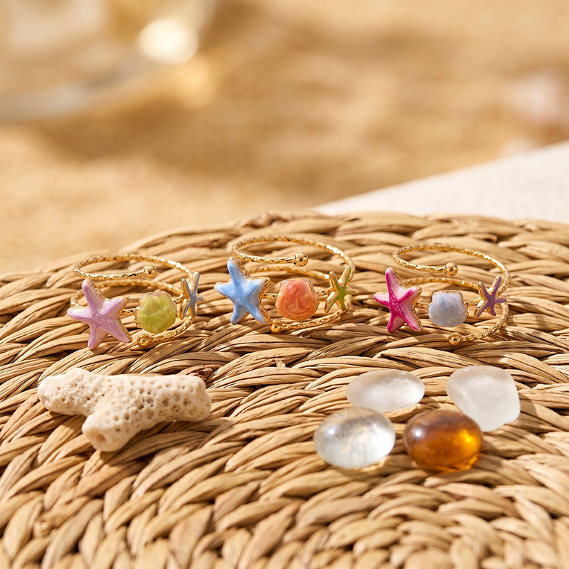 Tina Europa y los Estados Unidos color transfronterizo goteo estrella de mar anillo de nicho de diseño de vacaciones marinas joyas al por mayor mujeres