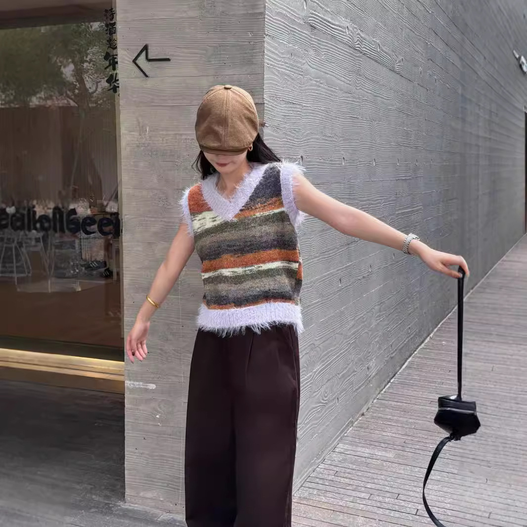 24 invierno Puyuan 2024 otoño y invierno nuevo diseño de rayas sueltas sensación de chaleco de punto suave glutinoso