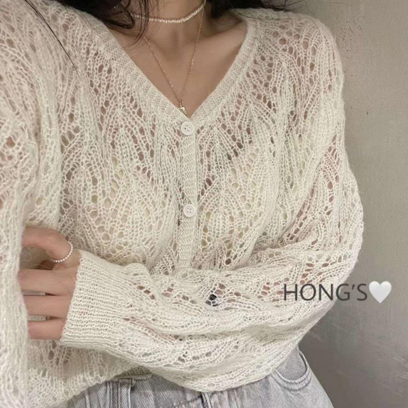 Spring and Summer New Knitted Cardigan Hollow Foreign Style V-Neck Air-conditioning Shirt Thin Knitted Cardigan Women's Coat Solid Color Sweater Spring and Summer New Knitted Cardigan Hollow Foreign Style V-Neck Air-conditioning Shirt Thin Knitted Cardigan Women's Coat Solid Color Sweater