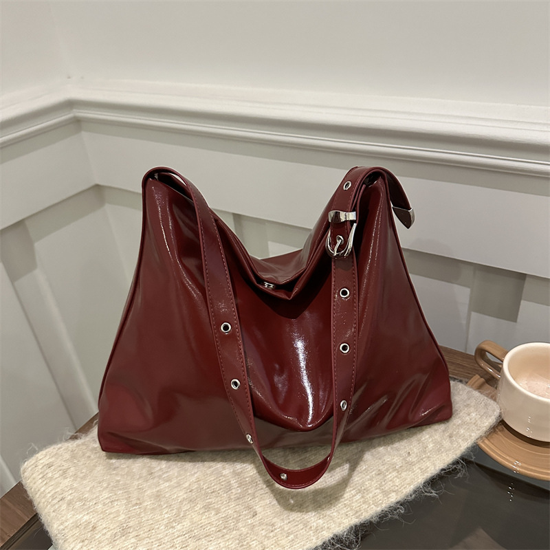 2025 nueva bolsa de hombro suave casual minimalista estilo coreano de personalidad para mujeres gran capacidad bolsa de mano mochila
