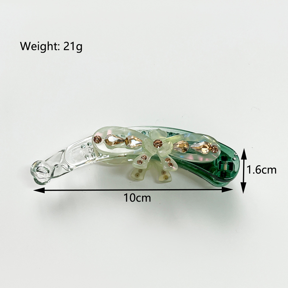 Pinza per capelli a banana con fiocco e strass elegante_voghion.com