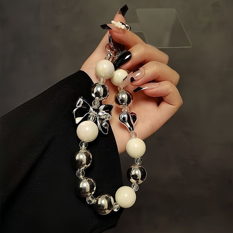 Ins Advanced Sense Super Flash Teléfono móvil Perlas de diamantes Adornos para teléfonos móviles Cadena anti-pérdida de todo fósforo Cadena para teléfonos móviles con lazo