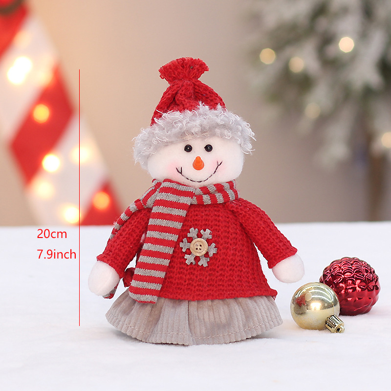 クリスマスの新しい赤いニットの布芸の座り方と伸縮できる老人の雪だるまのヘラジカの公仔の布景の装飾の置物|undefined