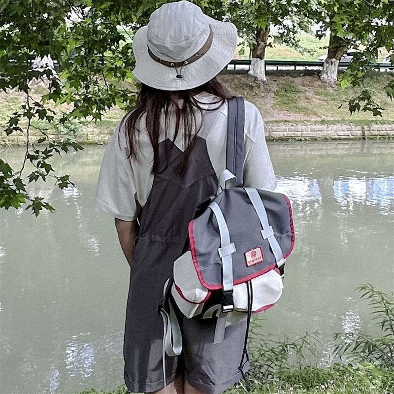 Mochila escolar para estudiantes de escuela primaria versión coreana de la mochila de deportes al aire libre de moda y fresca para niños
