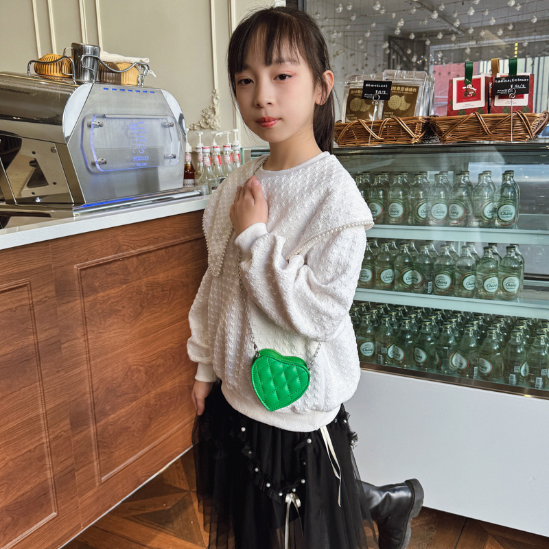 Cadena de moda, bolsos de hombro para niños y niñas, mini bolso de mensajero para bebés de color sólido simple, nuevo bolso de amor para niños