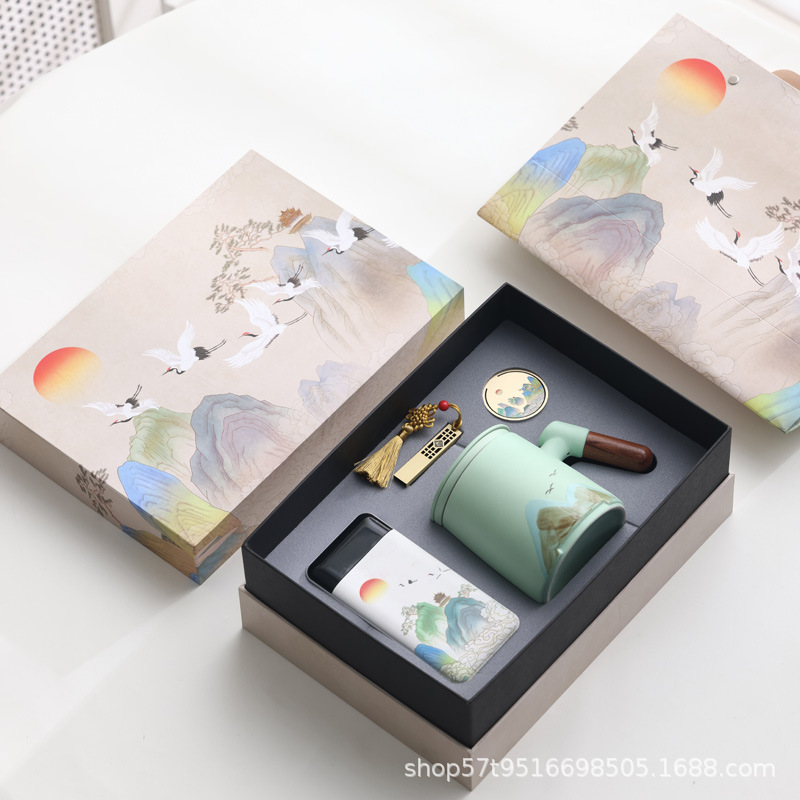 Taza de cerámica Jiangshan set de regalo de taza de marca de filtro de taza de agua de negocios de talla LOGO publicidad al por mayor