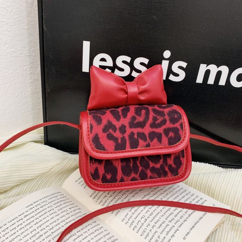 Moda coreana de leopardo para niñas bolso de hombro, bolso mini bebé de aire extranjero 2025 nuevo bolso de impresión para niños