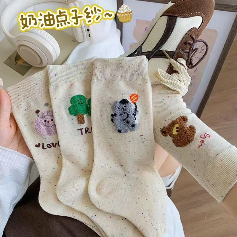 Flocado japonés linda chica hilo de puntadas dibujos animados otoño e invierno calcetines al por mayor Zhuji calcetines de mujer marea callejera