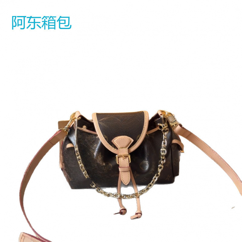 高品質のクロスボーダー新しいバッグレディースバックパックODYSSEEチェーンクラシック老眼バックパックペアバージョンドロップシッピング|undefined