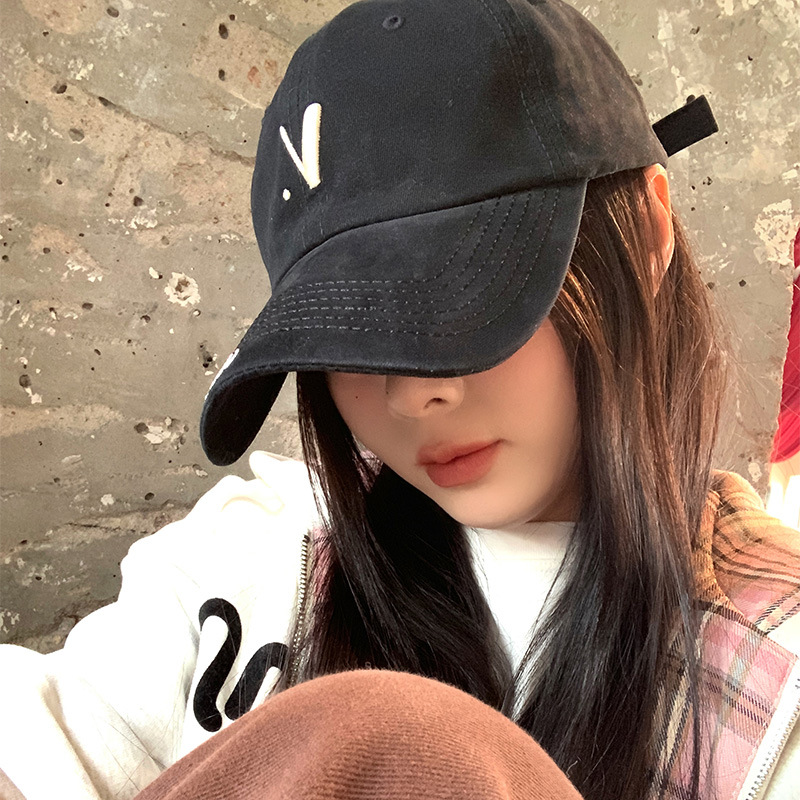 2025 nuevo sombrero de béisbol primavera-verano coreano pareja hipster negro cara pequeña letra picada lengua gorra de moda