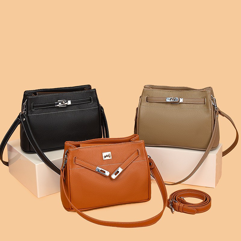 Otoño y invierno de 2024, nueva bolsa de hombro de mujer universal, bolsa de estilo simple, bolsa de transporte de viaje portátil, bolsa de sensación de alto nivel