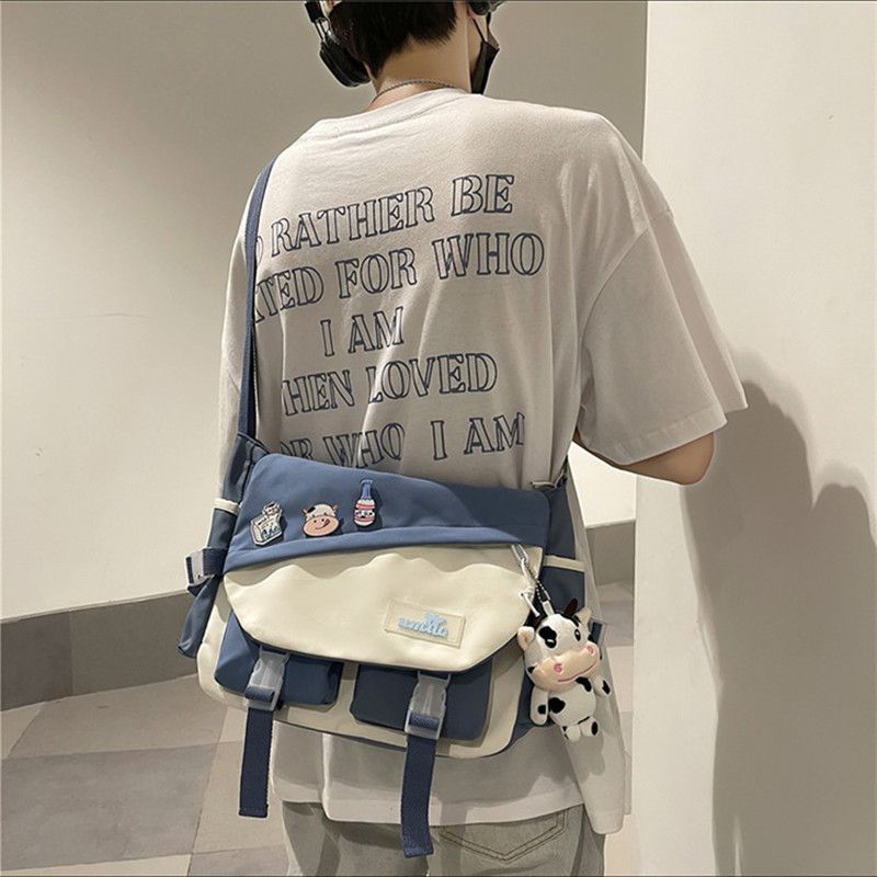 Bolso de hombro de moda para hombres, bolso de hombro para mujeres japonesas de gran capacidad, bolso de estudiantes casuales, bolso de cartero para hombres