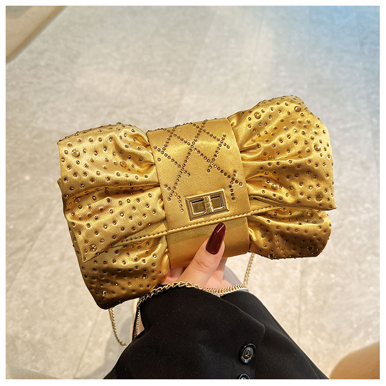 Paquete de cena de damas transfronterizas, paquete de fiesta de lujo ligero de diamante, paquete de cena de mano de arco de arco de oro de alto nivel